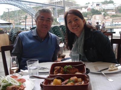 a couple eat a portuguese meal