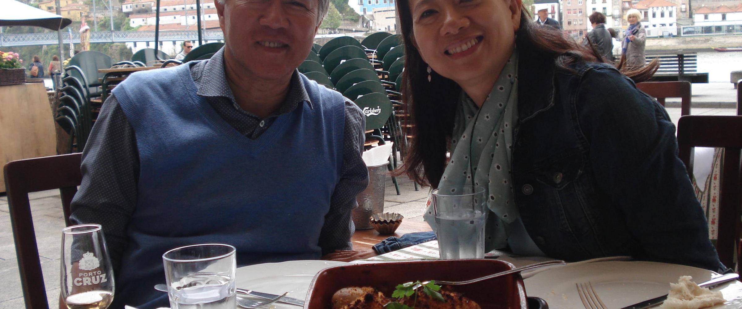 a couple eating a portuguese meal in Porto