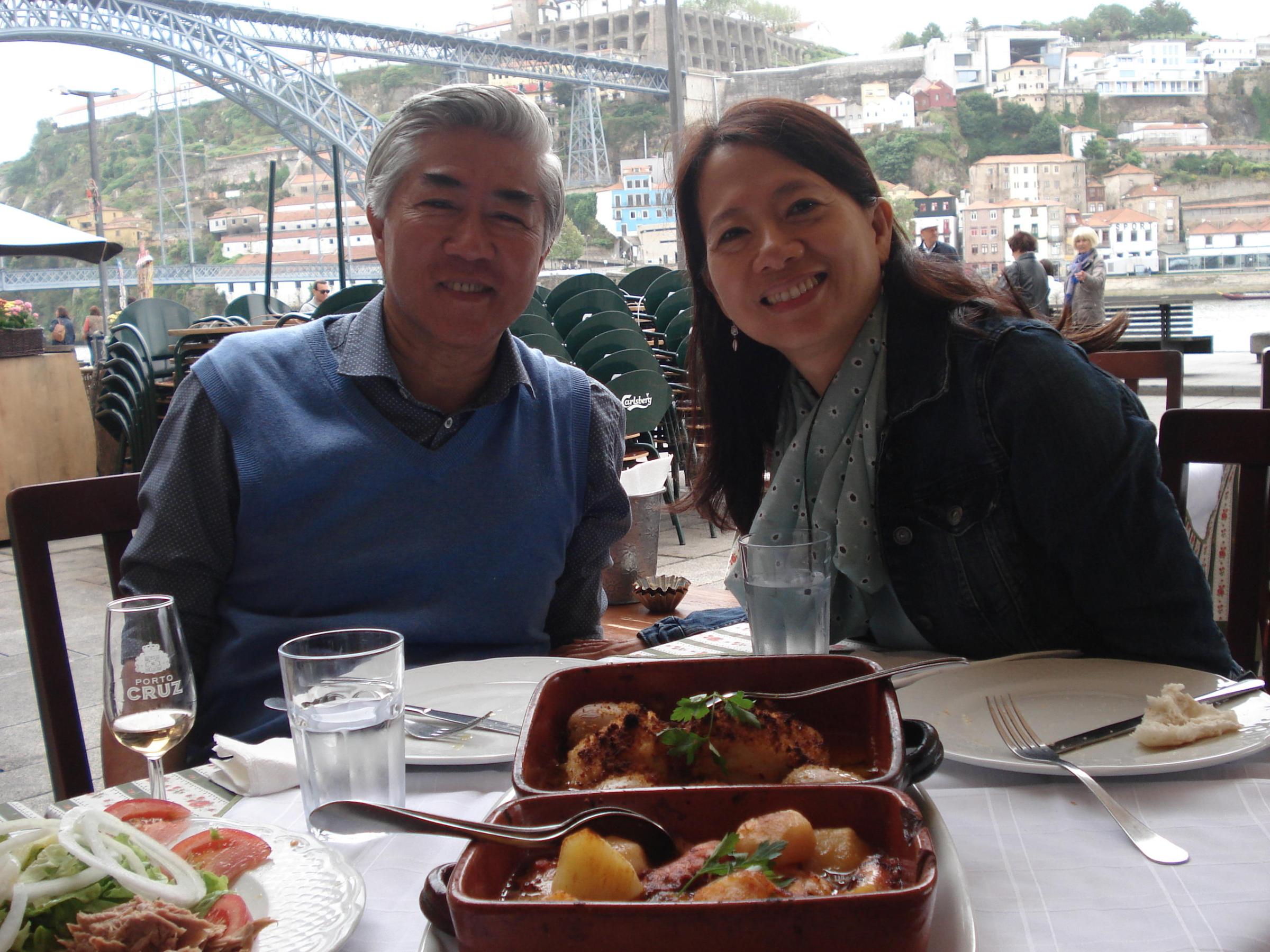 a couple eating a portuguese meal in Porto