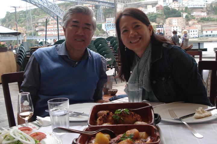 a couple eating a portuguese meal in Porto