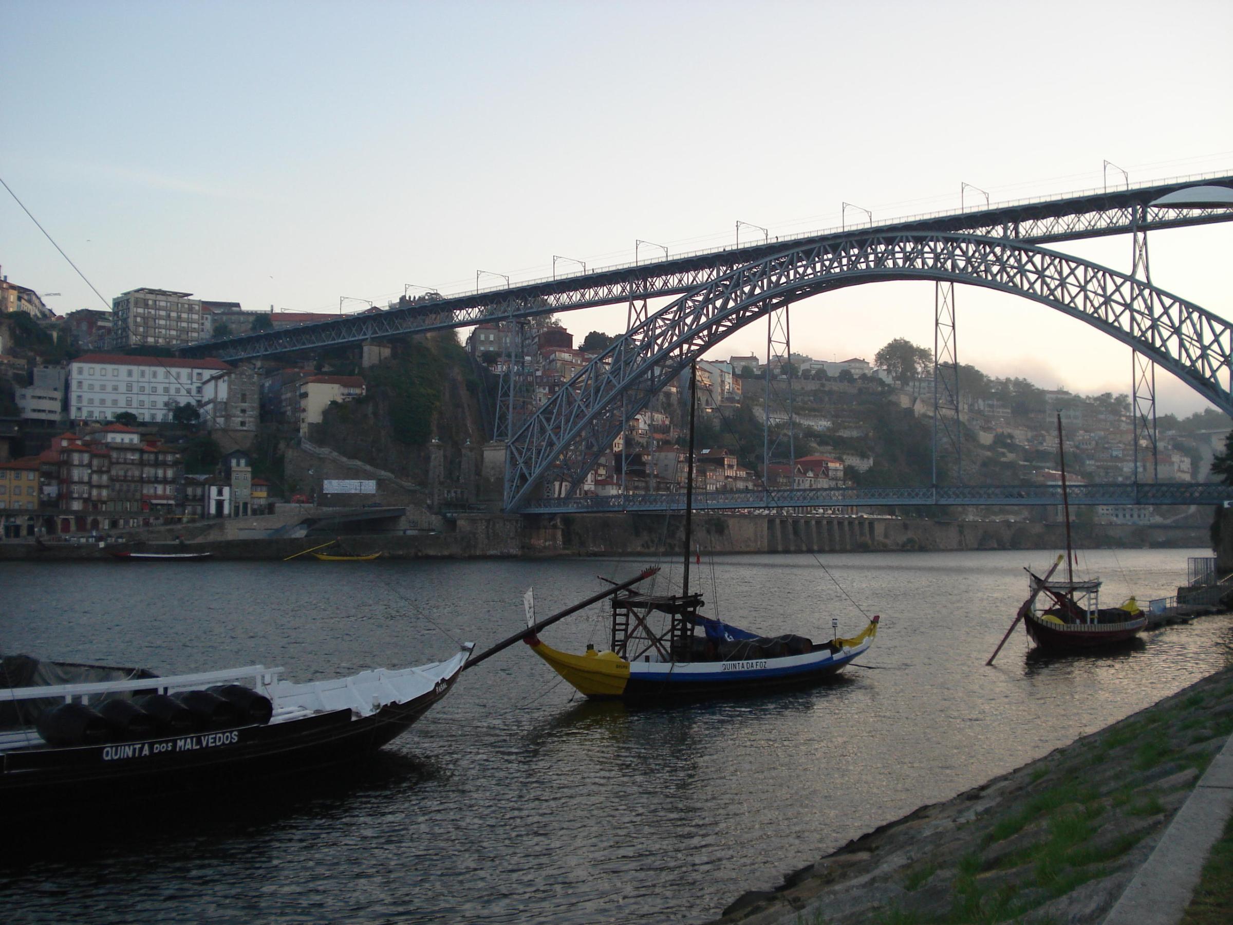 The calm waters of Douro River in Porto create a peaceful scene.