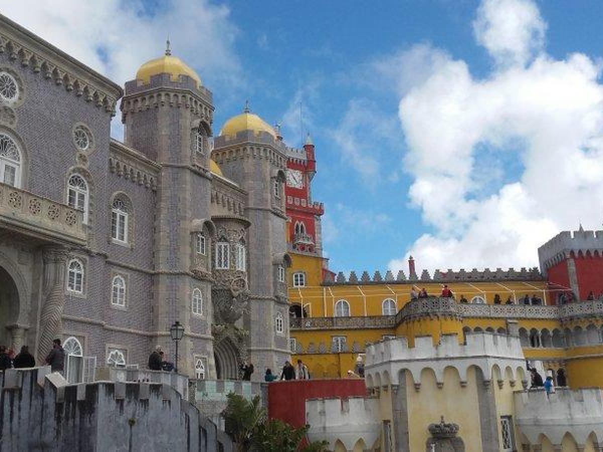 The impressive Pena Palace, with its size and colours, dominates the landscape.