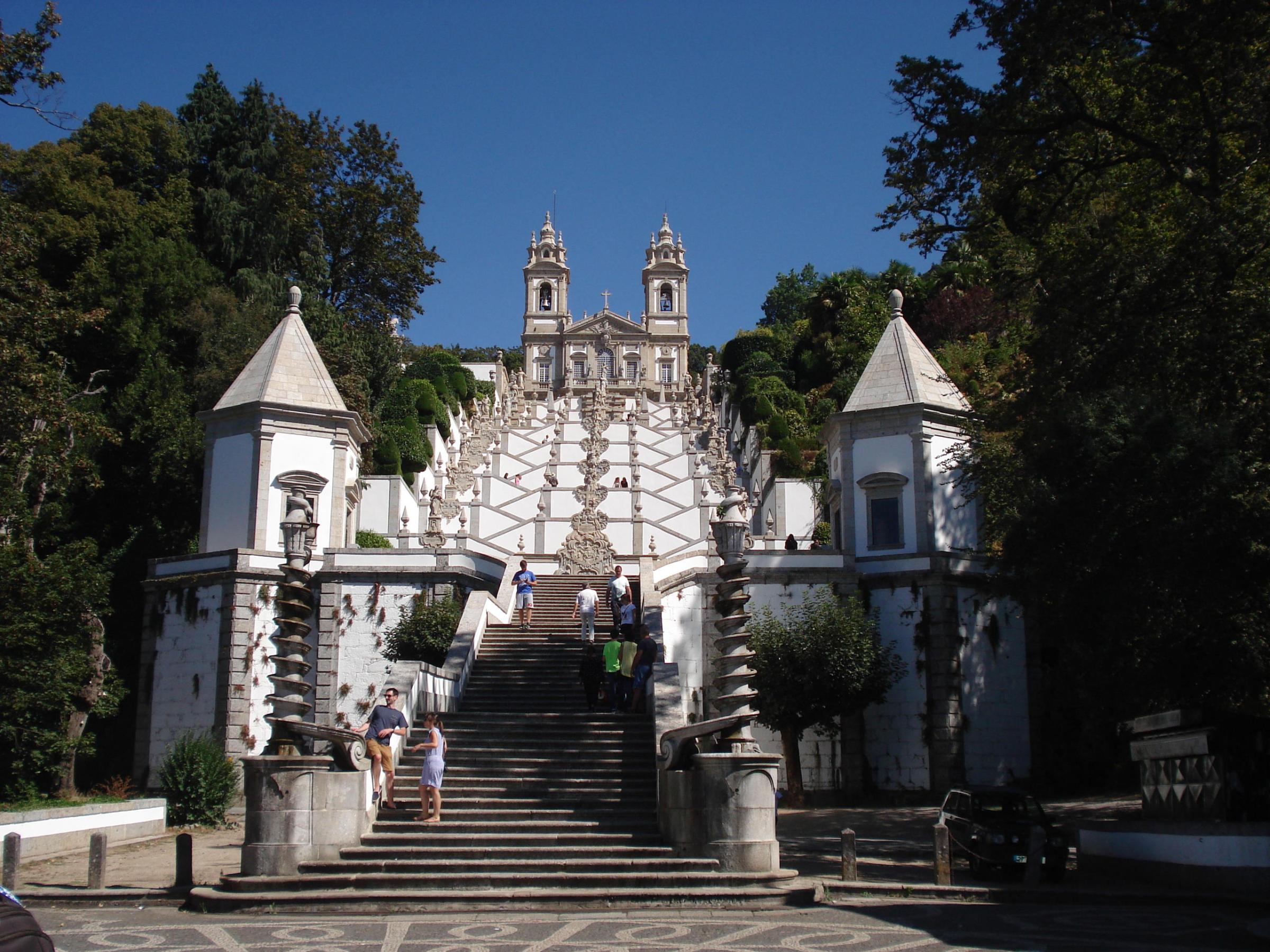 The majestic white structure of Bom Jesus, featuring impressive stairs, captured during a half-day Braga tour.