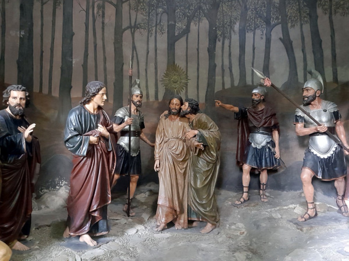 Statues of people elegantly displayed in the cave of Chapel Braga Bom Jesus, highlighting the beauty of the sacred space.