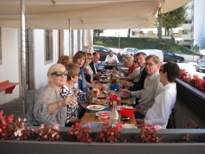 a group of people sitting at a table