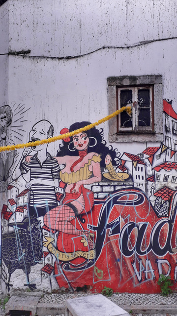 a colorful graffiti in Lisbon in honour to the fado music