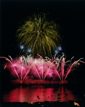 fireworks exploding in the dark Lisbon Portugal New Year's Eve