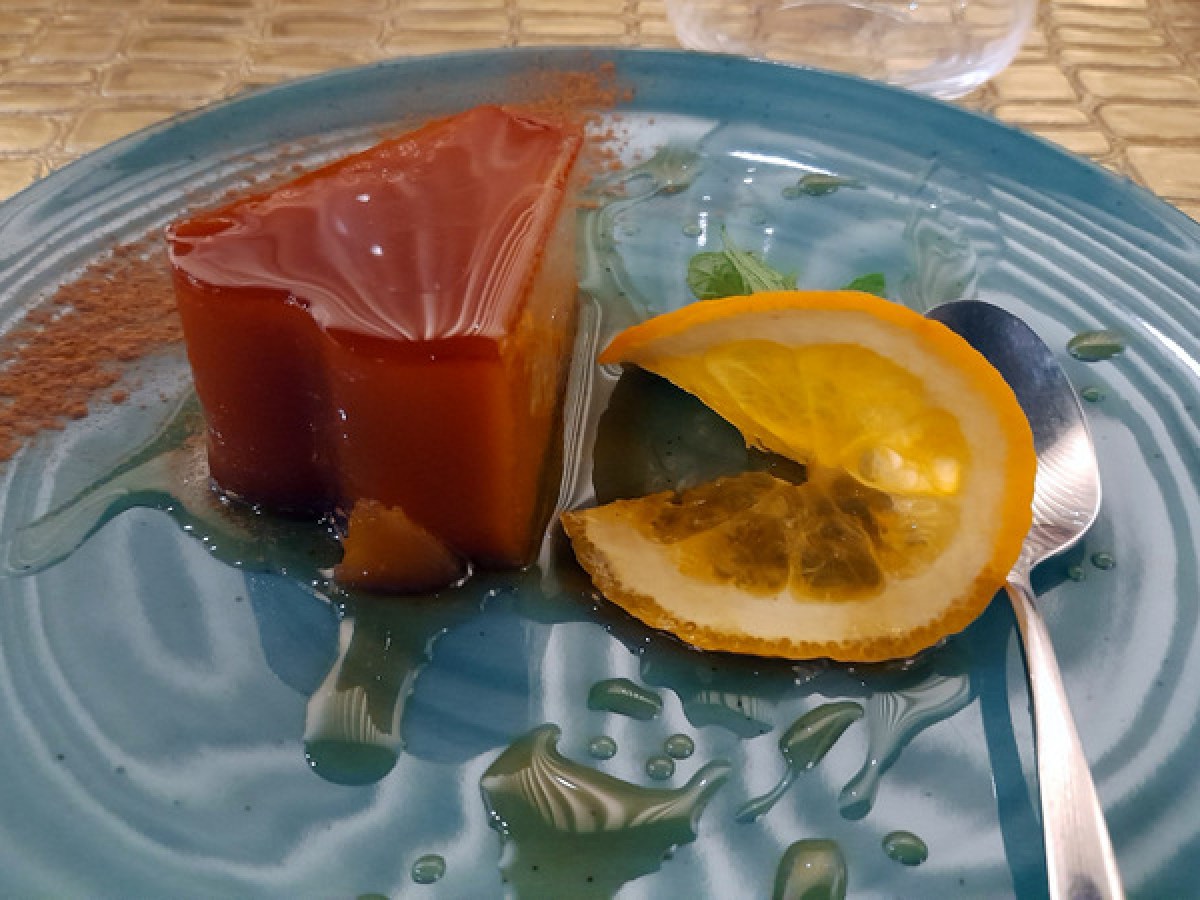 a slice of pudding on a plate abade de prisco