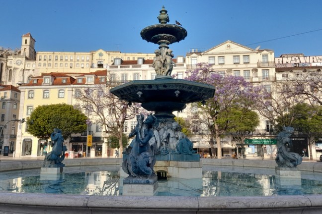 rossio statues during lisbon walking tour