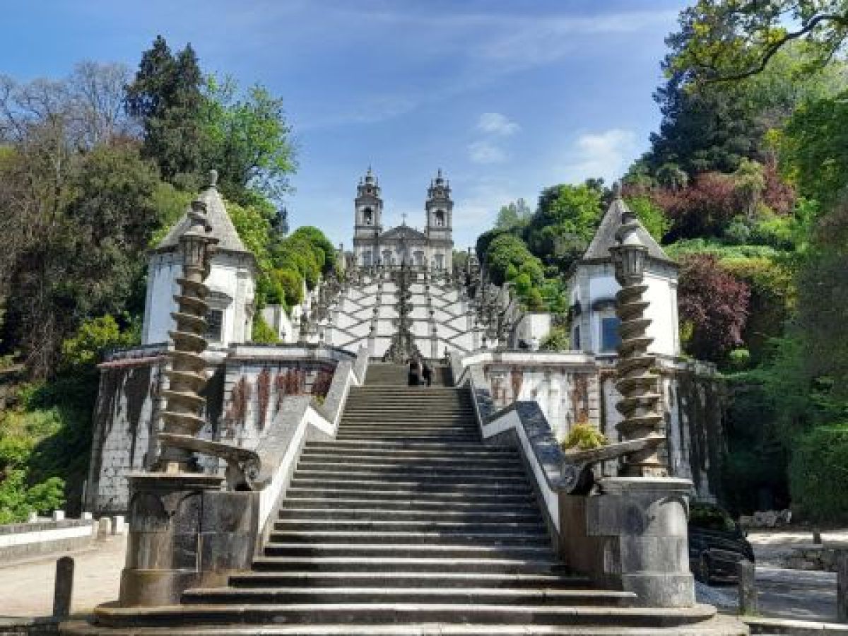 Bird's-eye view of Bom Jesus church, capturing its grandeur and the surrounding scenery during a tour in Braga.