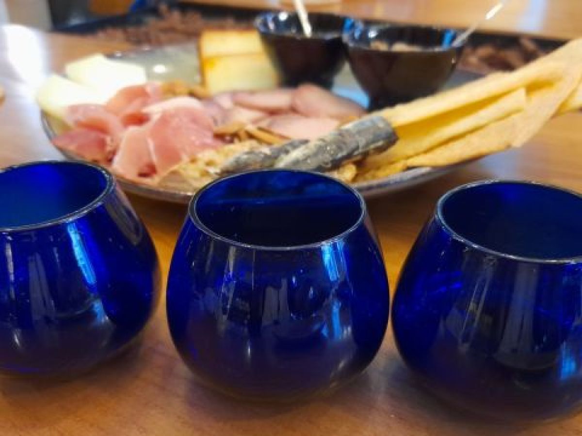 a group of glass bottles on a table