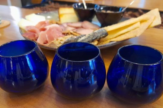 a group of glass bottles on a table